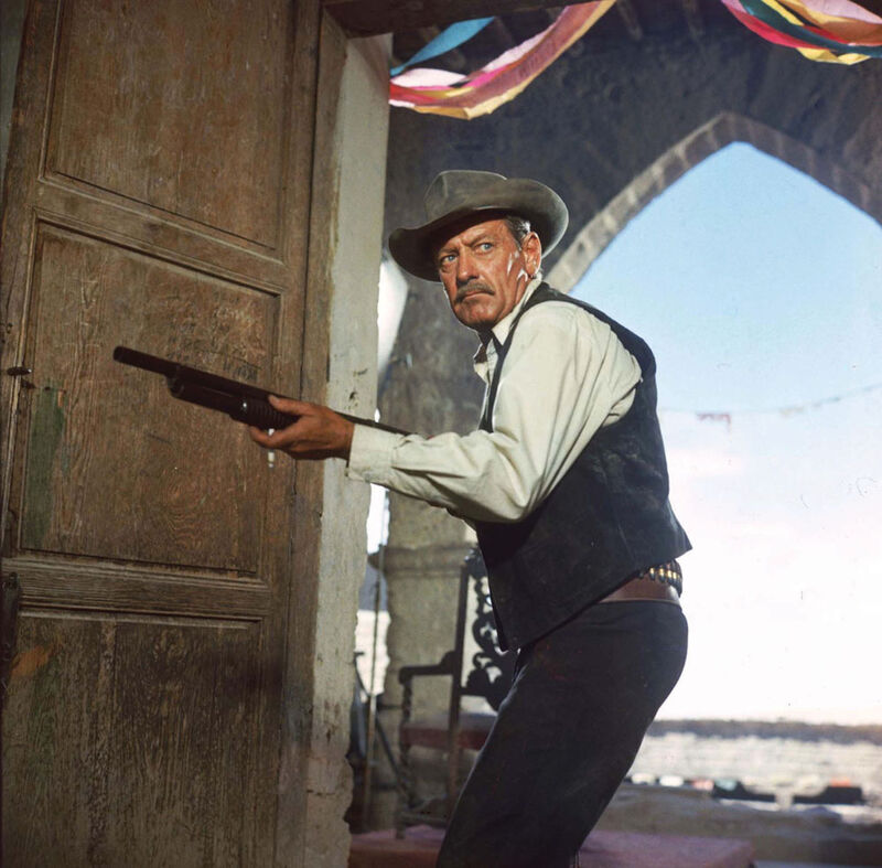 Cowboy holds a gun in The Wild Bunch