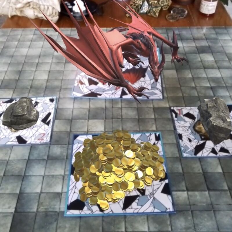 A screen grab from the game Battle Maps AR, which shows dragons landing on a 3D chessboard.